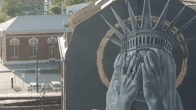A Mural in France Confronts America’s Immigration Shame